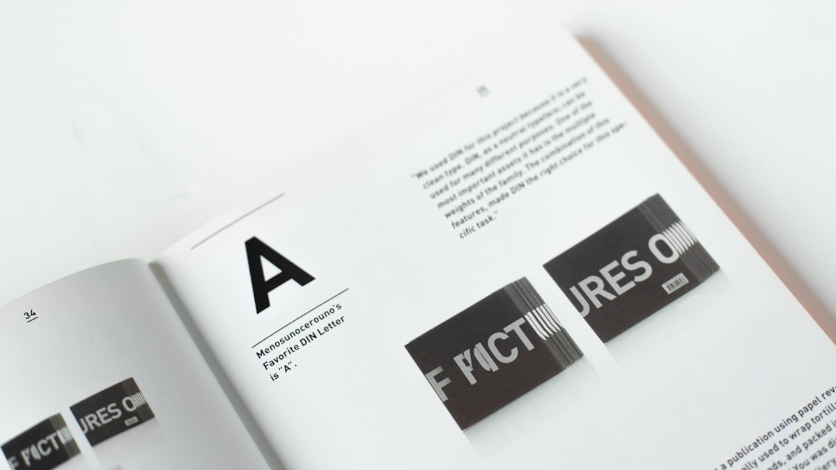 An open type specimen book showing an oversized letterform