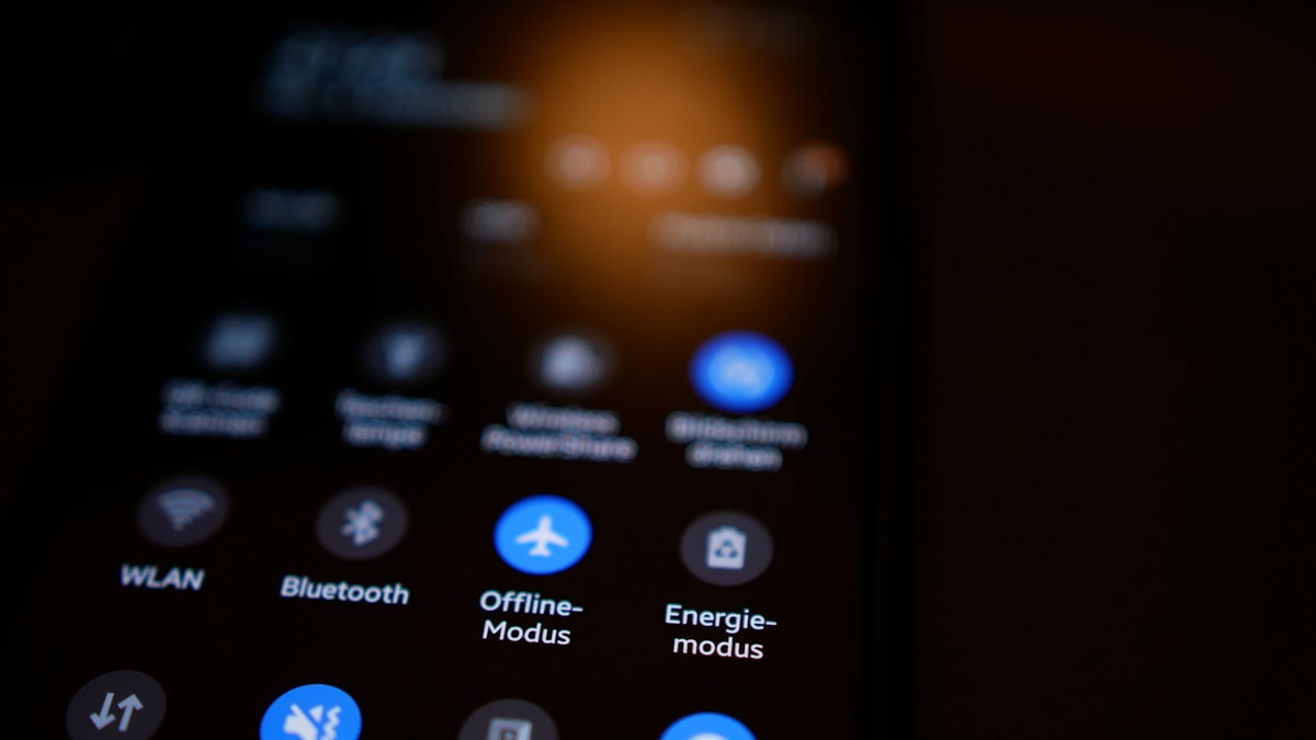 A phone settings panel rendered in a dark theme